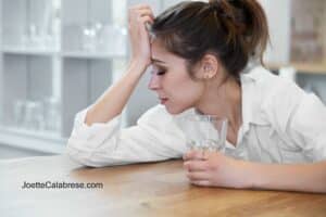 Portrait of woman with headache